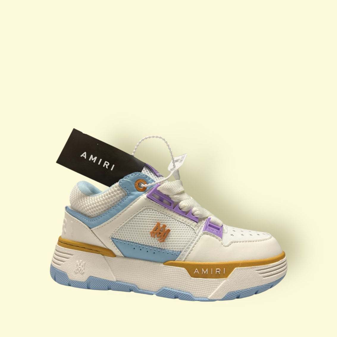 AMIRI MA-1 sneaker in white with purple and blue accents, premium stylish design