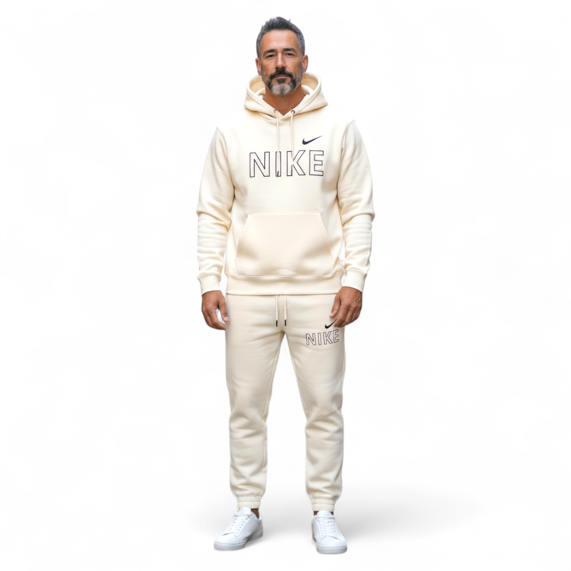 Man wearing beige Nike tech fleece tracksuit with hoodie and joggers on white background