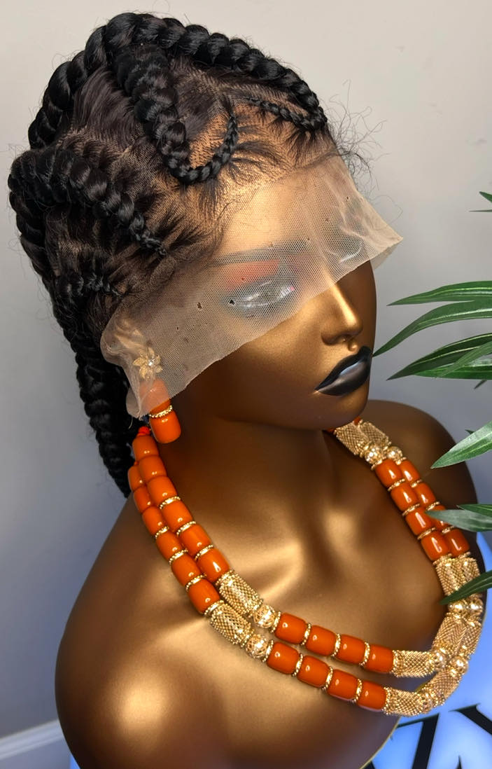 Full lace frontal cornrow braided wig on mannequin styled for Black women with natural hairline and orange beaded necklace