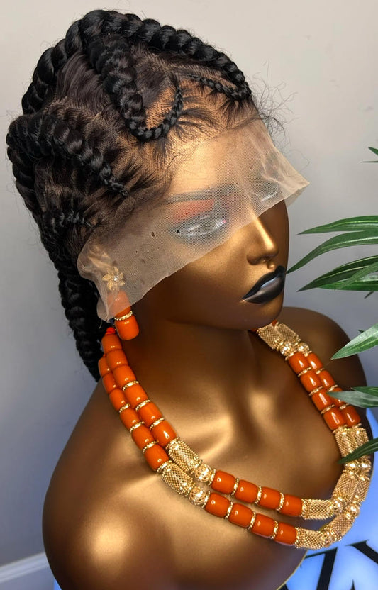 Full lace frontal cornrow braided wig on mannequin styled for Black women with natural hairline and orange beaded necklace