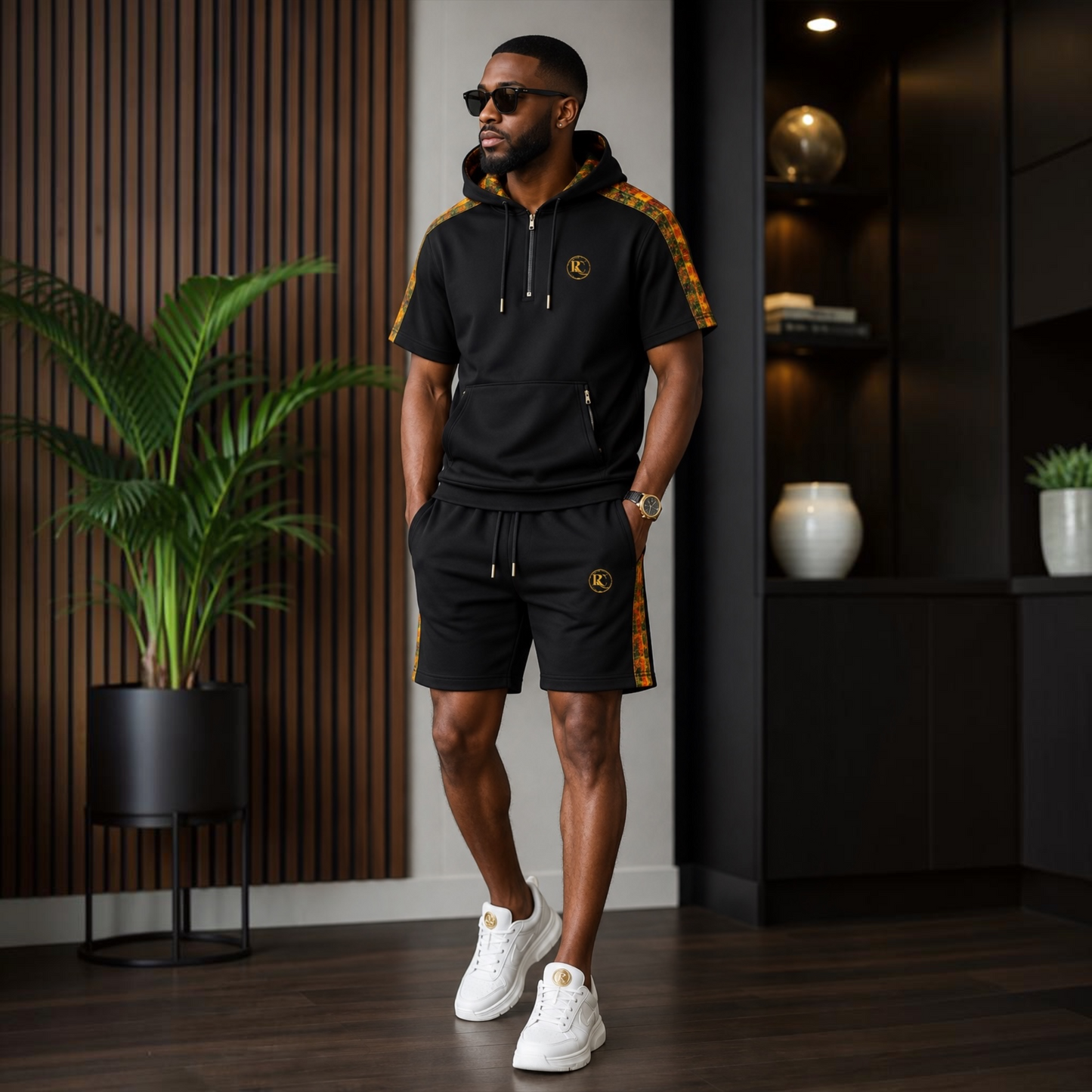 Romzy Casual luxury black Kente hoodie and shorts set with gold emblem and African-inspired design